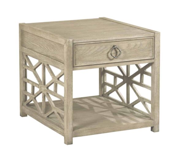 end table with drawer and filigree sides in furniture store in Mexico